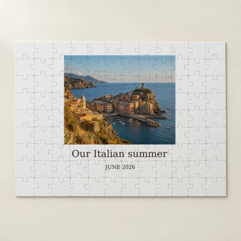 Realistic jigsaw puzzle printed with a coastal photograph and Our Italian summer caption